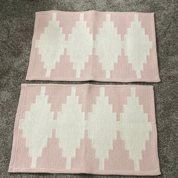 Home Essentials Other - Set of two 20”x34” rugs by Home Essentials. Color is a soft pink and white.